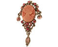 Broche i s�lvfarve med ovalt motiv